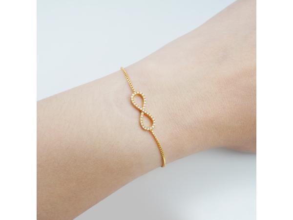 Goudkleurige armband infinity briljanten moissaniet 1.10 ct