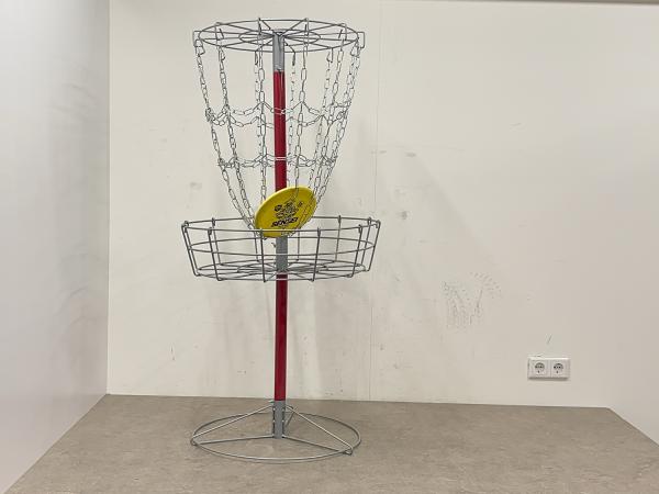 Discgolf mand met disc