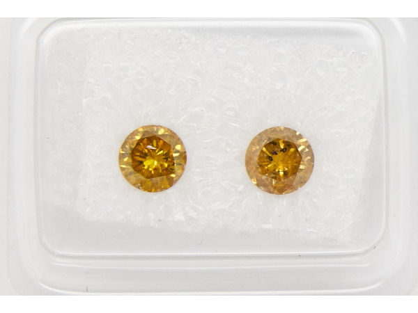 Behandelde diamanten – Rond briljant – Fancy geel/oranje