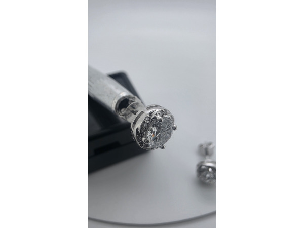 Wit gouden oorbellen met diamant 2 x 0,50 crt ( IGI ) – foto 3 – kavel bij XL Auctions