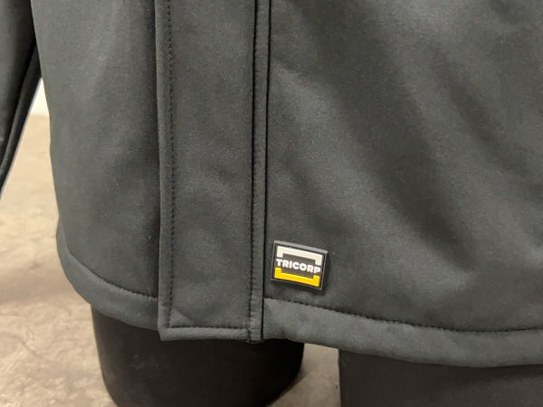 Tricorp softshell jas maat L zwart/oranje – foto 3 – kavel bij XL Auctions
